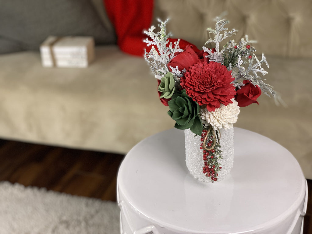 faux flower christmas decor in red and green