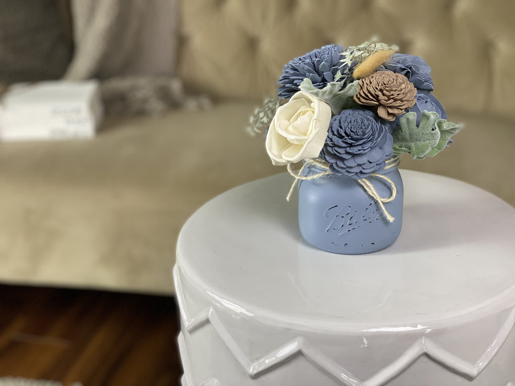 blue and beige sola wood flower arrangement for nursery baby boy congrats