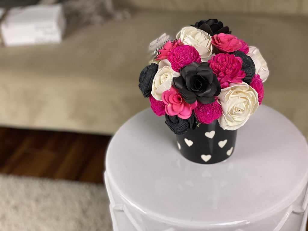 sola wood flowers in hot pink and paper flowers in black