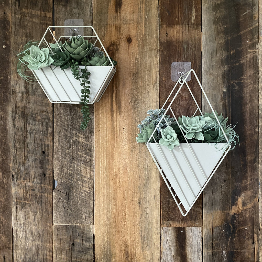 geometric hanging succulent garden made from green sola wood flowers and faux succulents