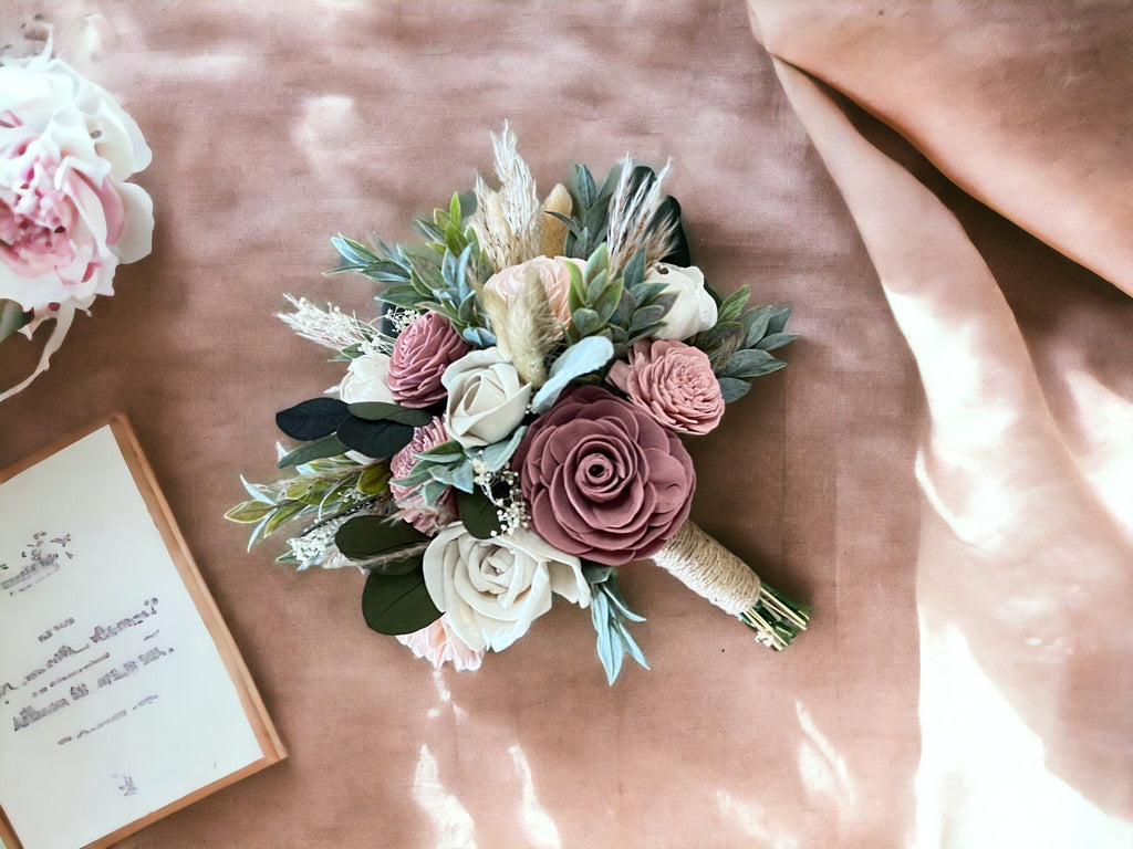 rustic sola wood flower bouquet in blush and dusty rose with pampas grass perfect for a barn wedding in custom colors