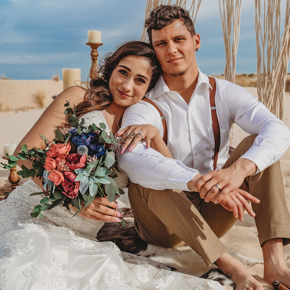 custom sola wood flower bouquet from pine and petal weddings in boho style with bride and groom