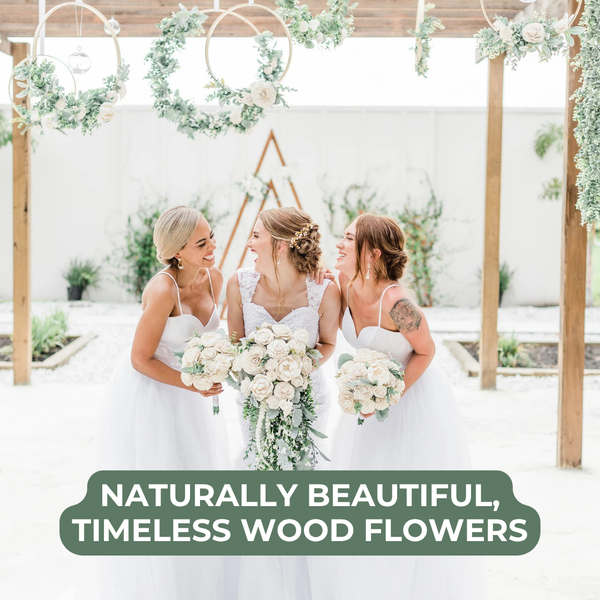 Delicate sola wood flower white bouquet with greenery and pearls in a cascading bouquet style