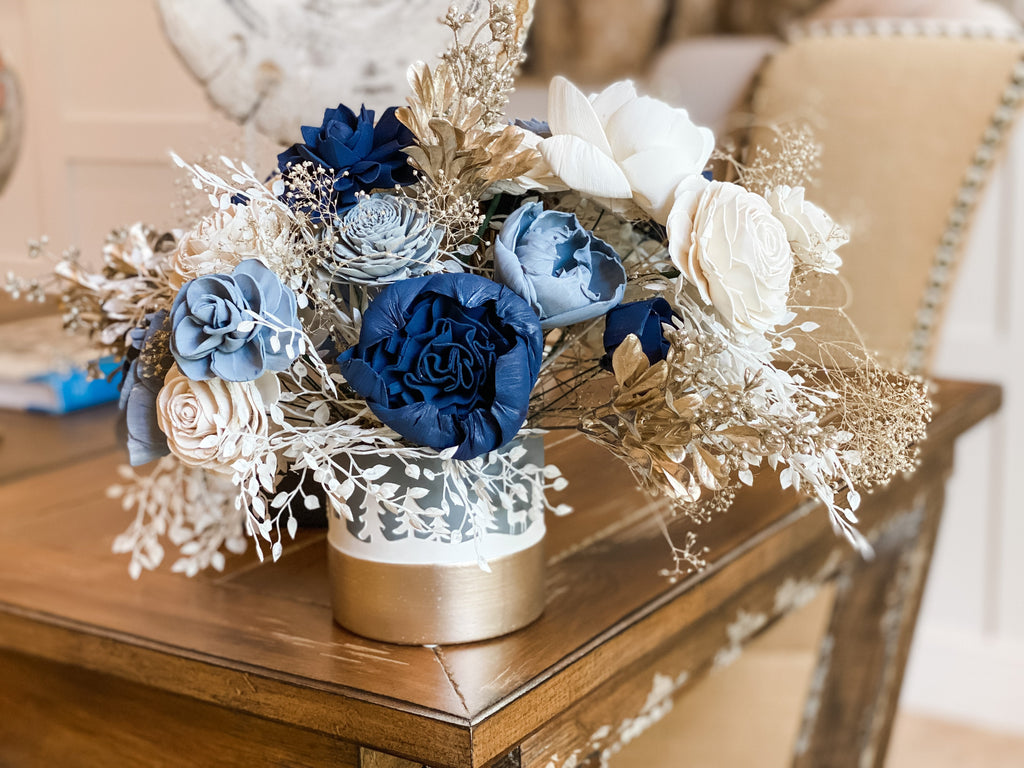 winter asymmetrical centerpiece for table decor in blue