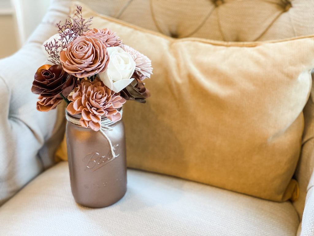 quart size mason jar faux flower arrangement for weddings and decor with rose gold, blush and pink