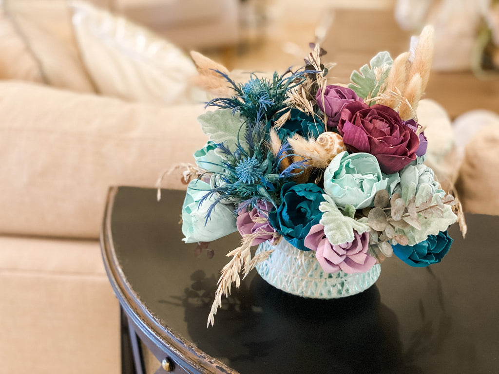 sea shell centerpiece arrangement made with sola wood flowers