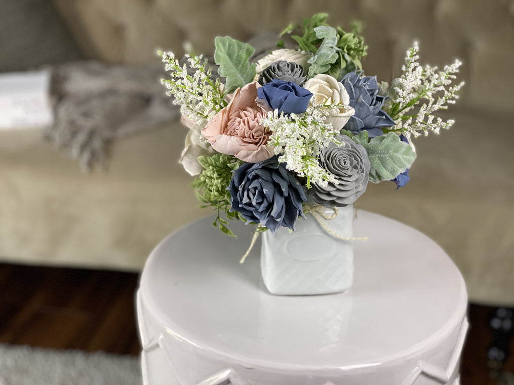 grey, white, peach and blue sola wood flower arrangement with succulents for birthday gift