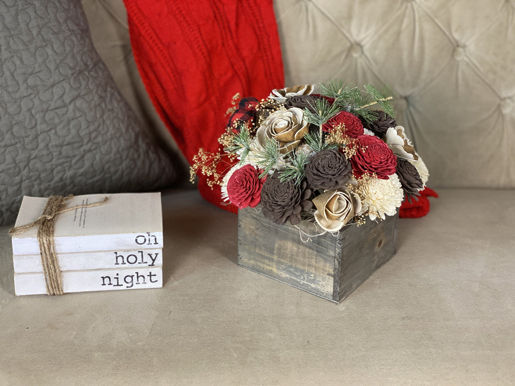 sola wood christmas flower arrangement by pine and petal market with red buffalo check