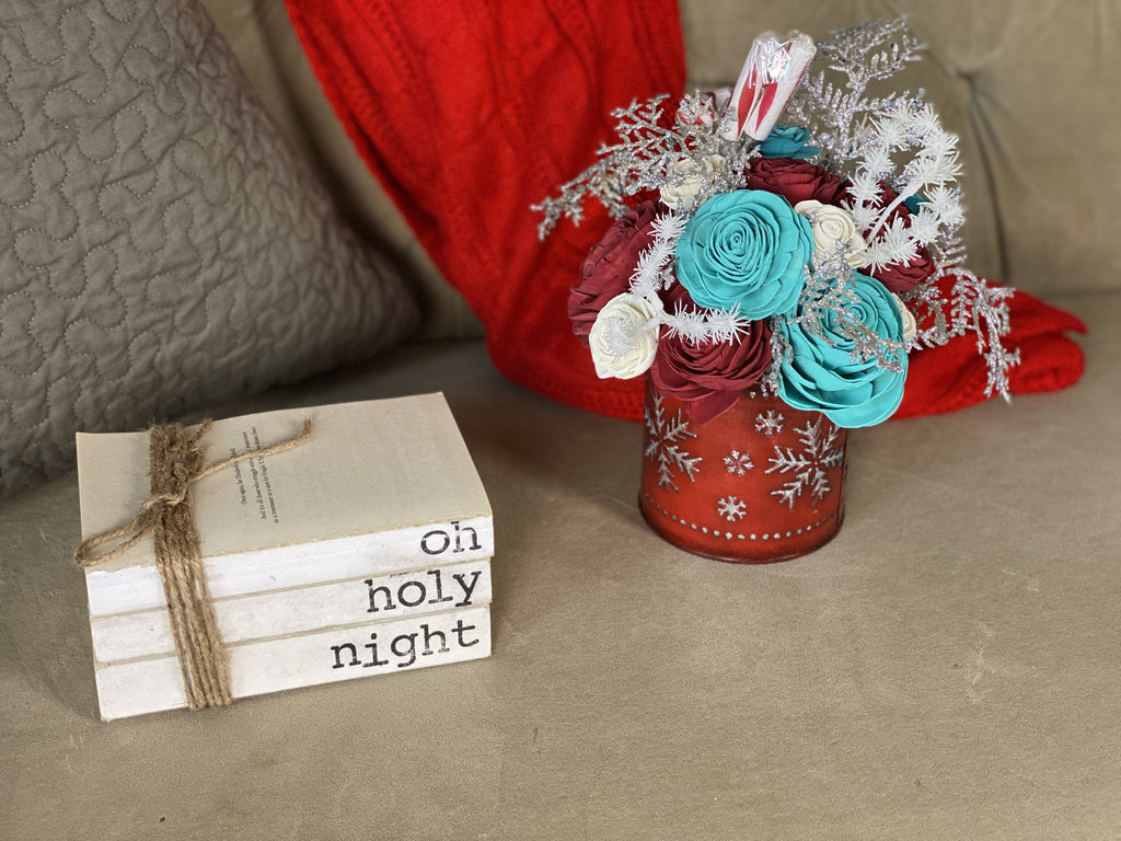 send a festive christmas bouquet with red and teal and peppermint candies