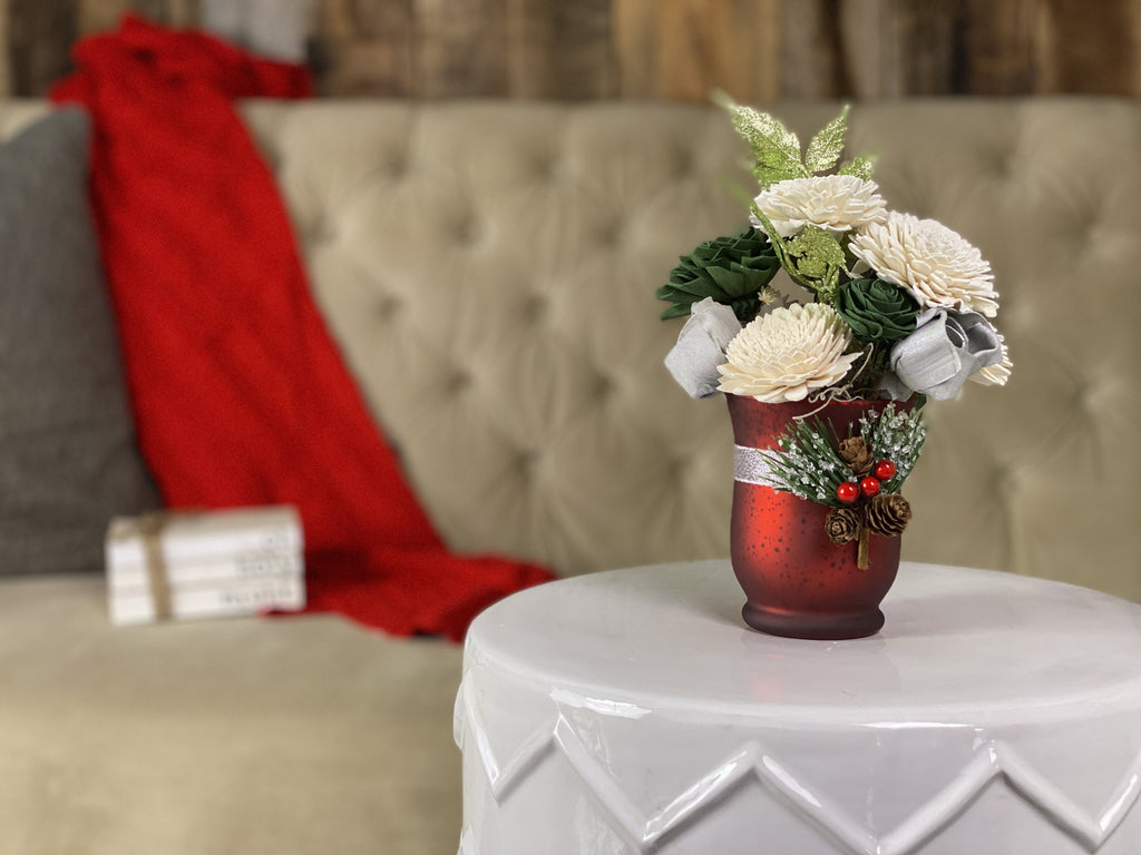red votive sola wood flower arrangement with pinecone