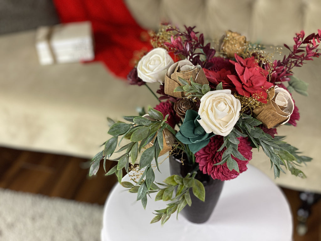 christmas sola flower centerpiece ideas with poinsettias and pine