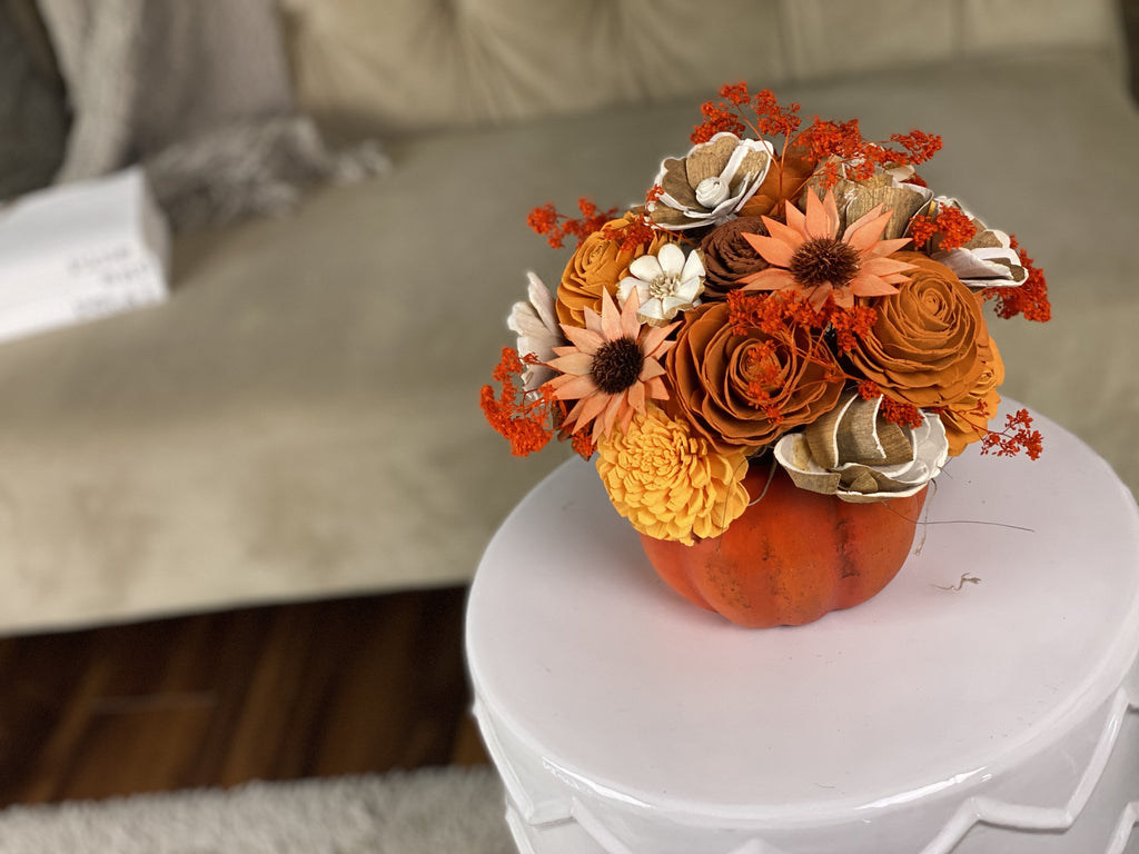 Fall wedding centerpiece ideas with pumpkins made from sola wood flowers 