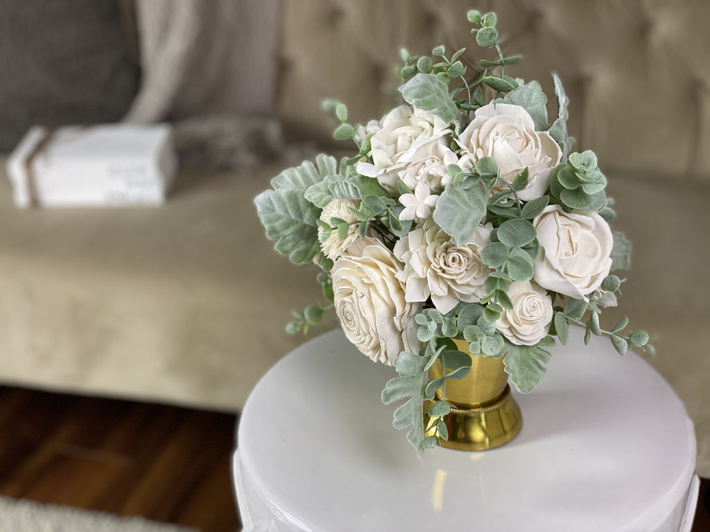 sympathy sola wood flower arrangement with white flowers and greenery 