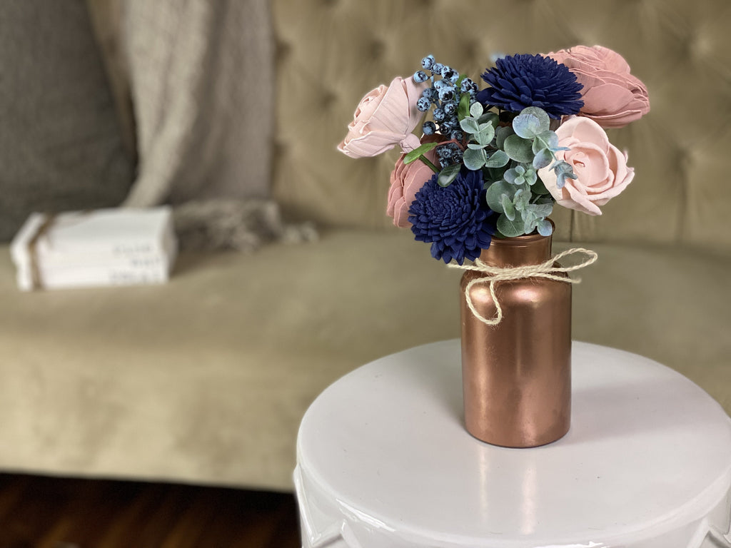 small faux flower arrangement decor ideas for wedding with navy and blush flowers made from sola wood