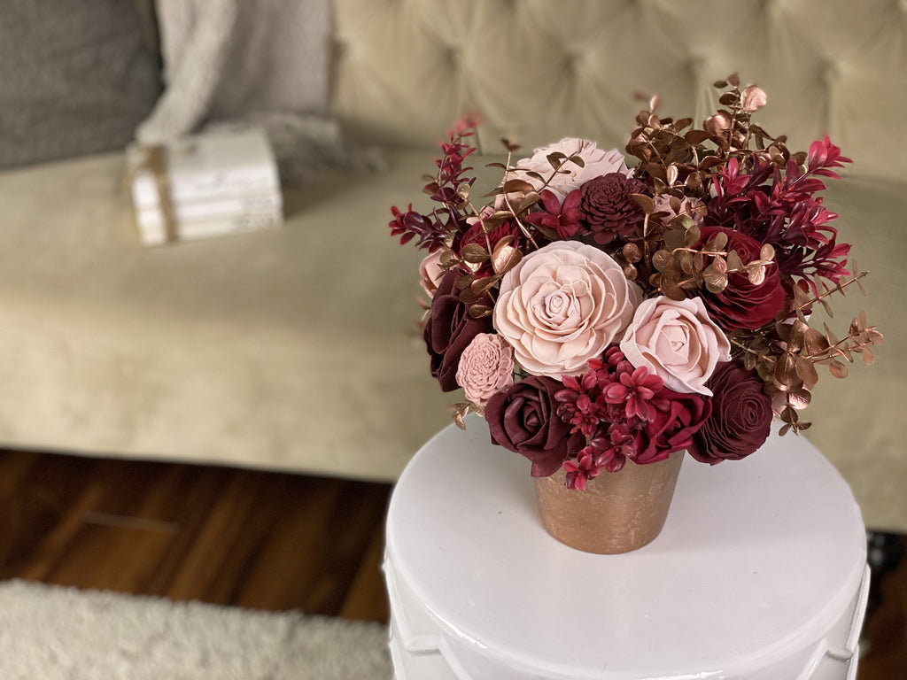 send a flower arrangement centerpiece for valentines day with rose gold, red and blush roses
