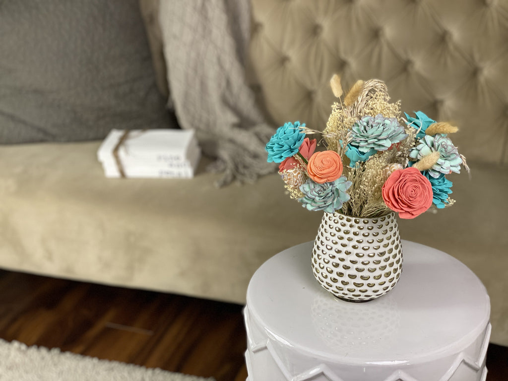 beach themed delicate sola wood flower arrangement in coral and mint