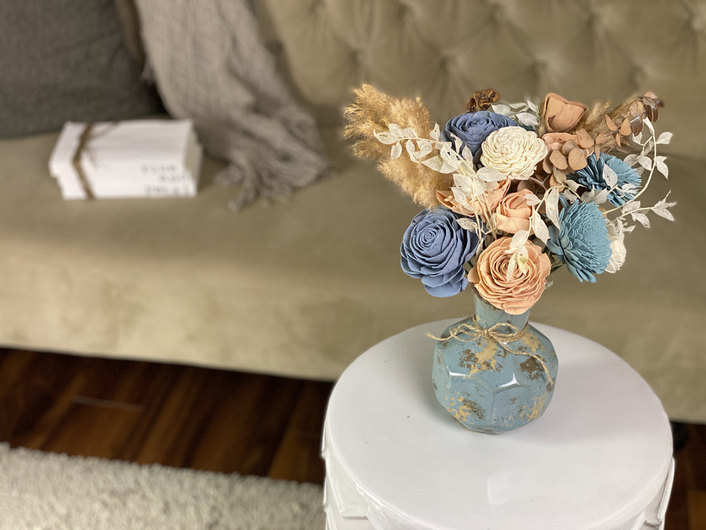 sola wood flower arrangement in blue and peach - boho blues