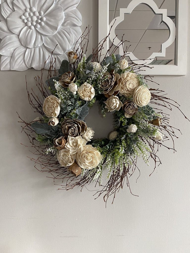 white and greenery sola wood flower wreath with grapevine