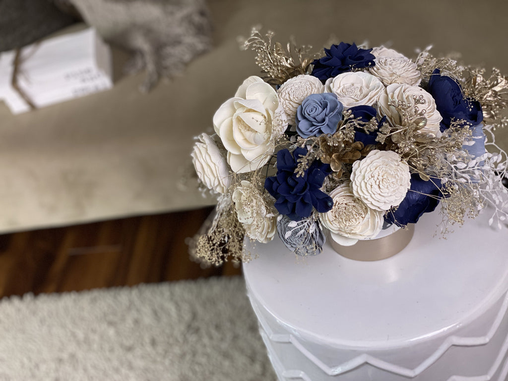 white, dusty blue and navy sola wood flower arrangement for winter holiday gift
