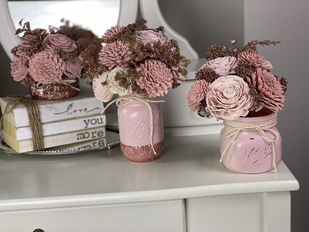 sola wood flower arrangements for centerpieces at weddings and events in blush pink and dusty rose