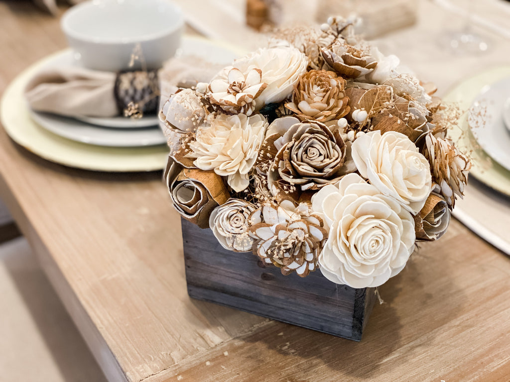 sola wood flower arrangement with natural wood flowers and winter faux flowers