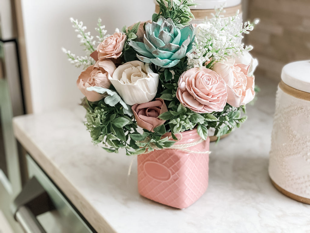 pink and succulent sola flower arrangement for birthdays