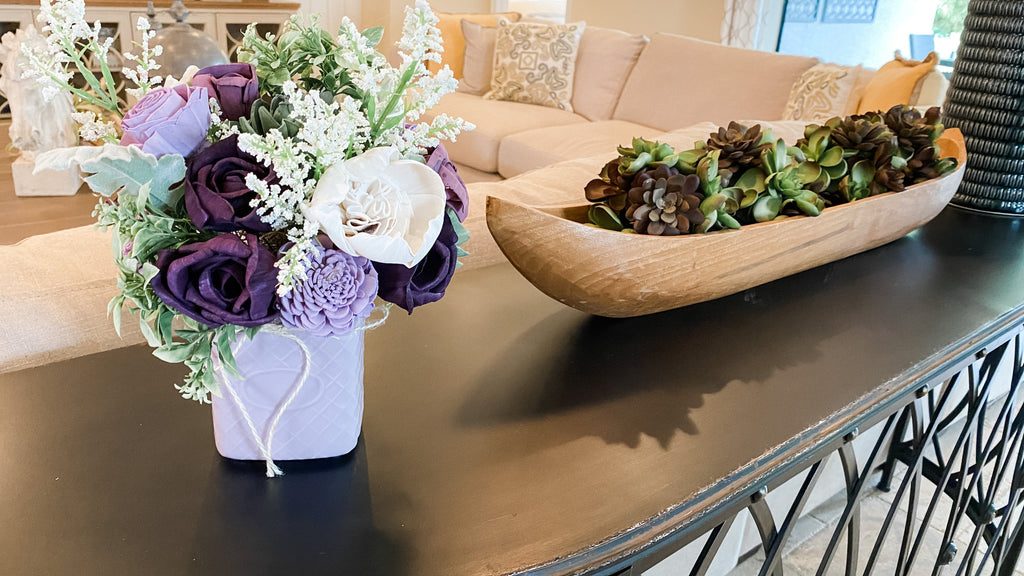succulent sola wood flower arrangement with purple vase