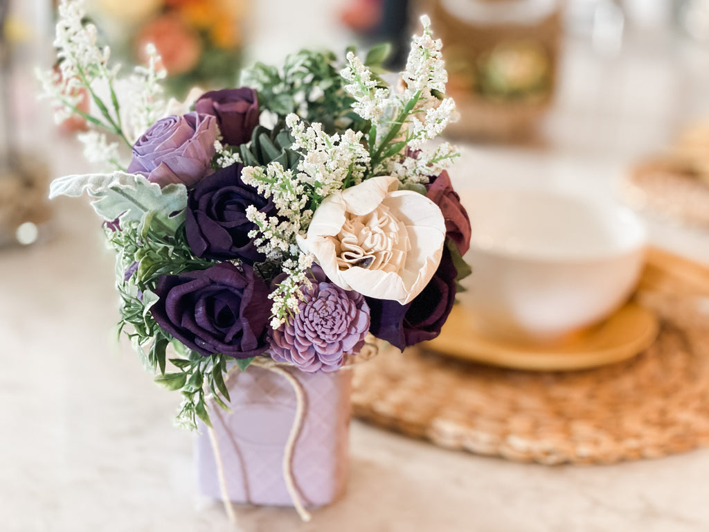 sola wood flower arrangement in purple by Pine and Petal sola flower market