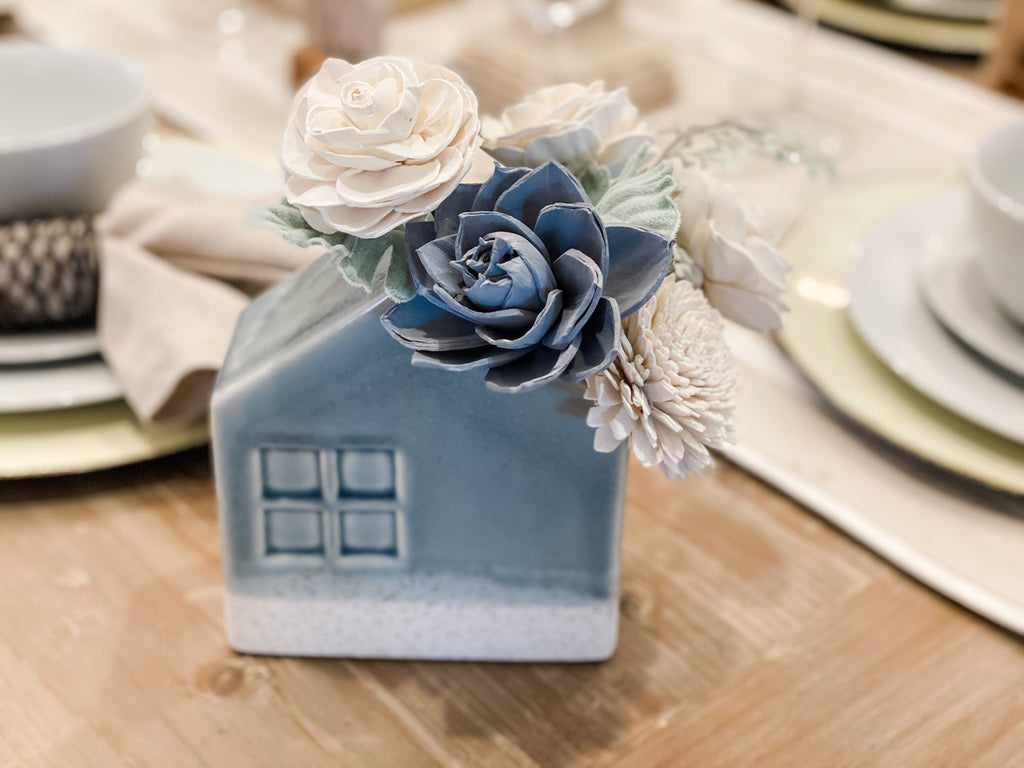 send a bouquet of flowers to a new home owner as a gift 