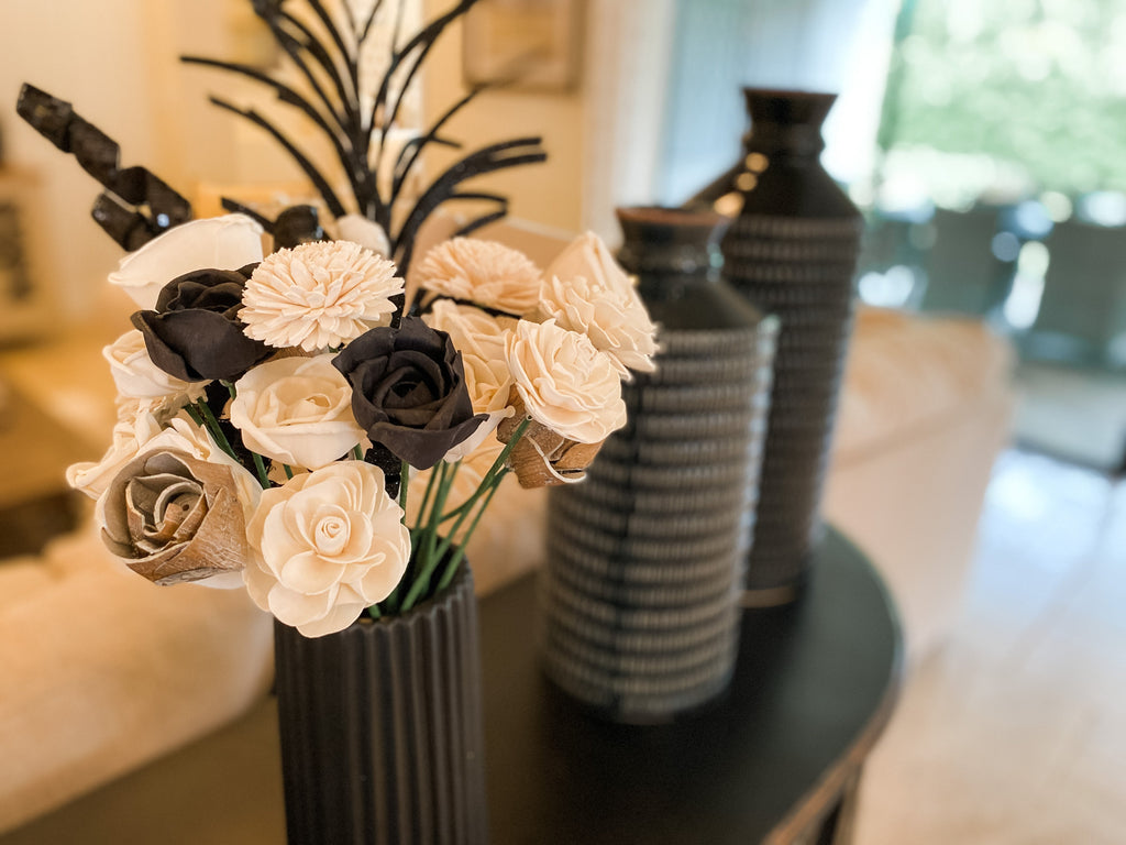 black and white flower arrangement for corporate party or new years party