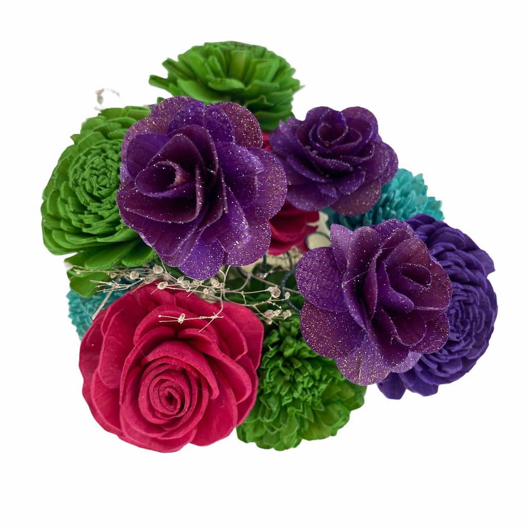 delicate sola wood flower arrangement in bright colorful christmas 