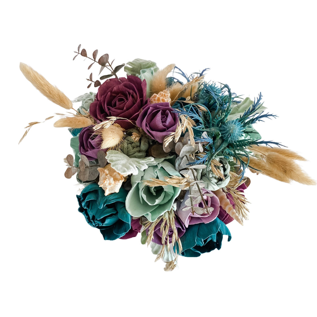 beachside flower arrangement for mom with purples and teals
