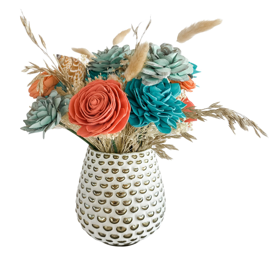 coral and mint faux flower arrangement with seashells by pine and petal market