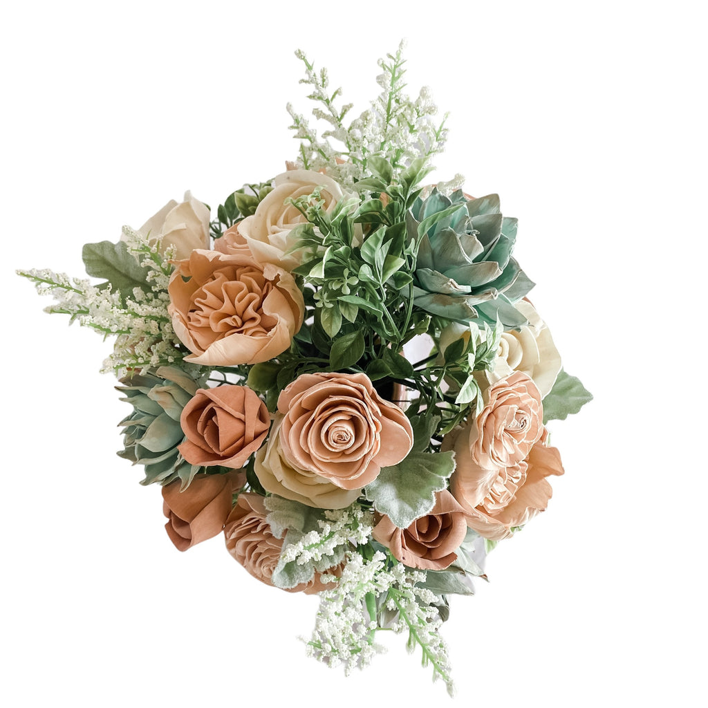 sola flower arrangement with pink roses and succulents