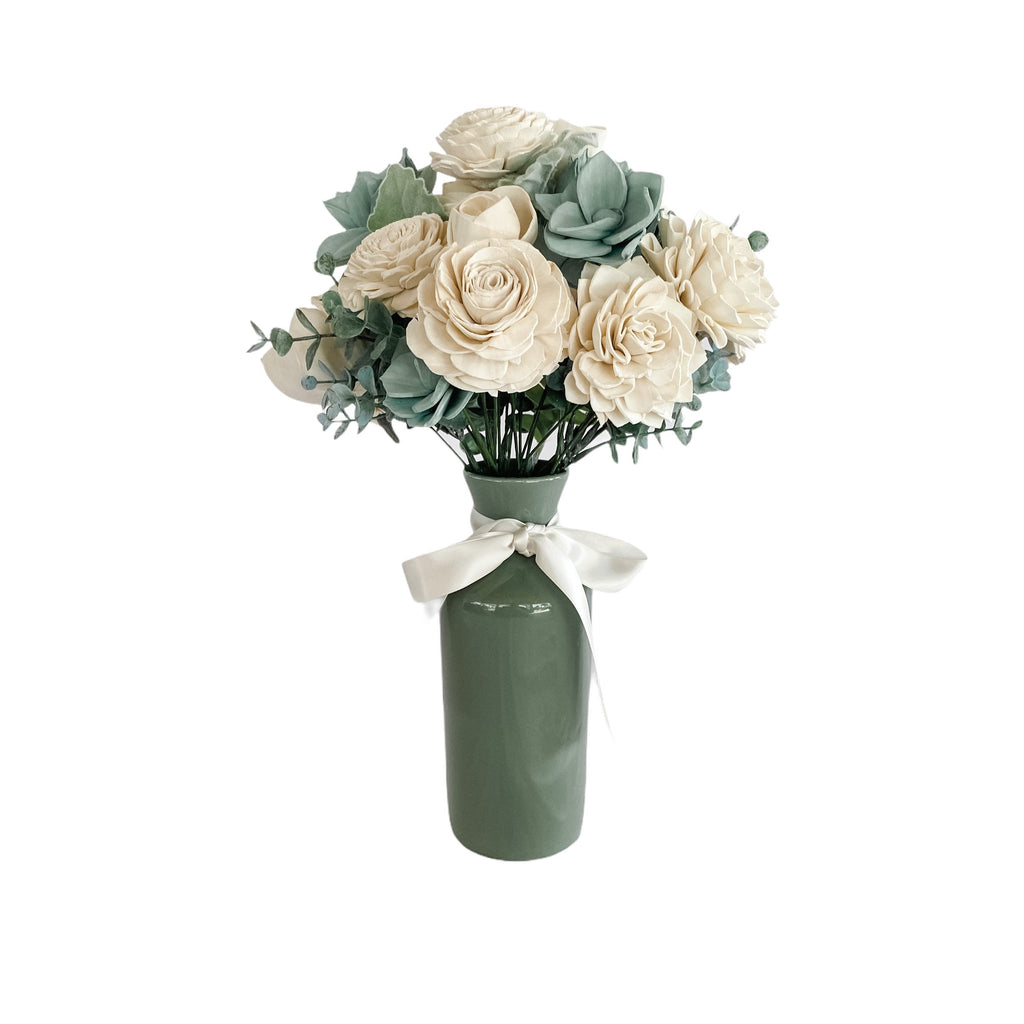 sympathy bouquet arrangement with succulents in white and green