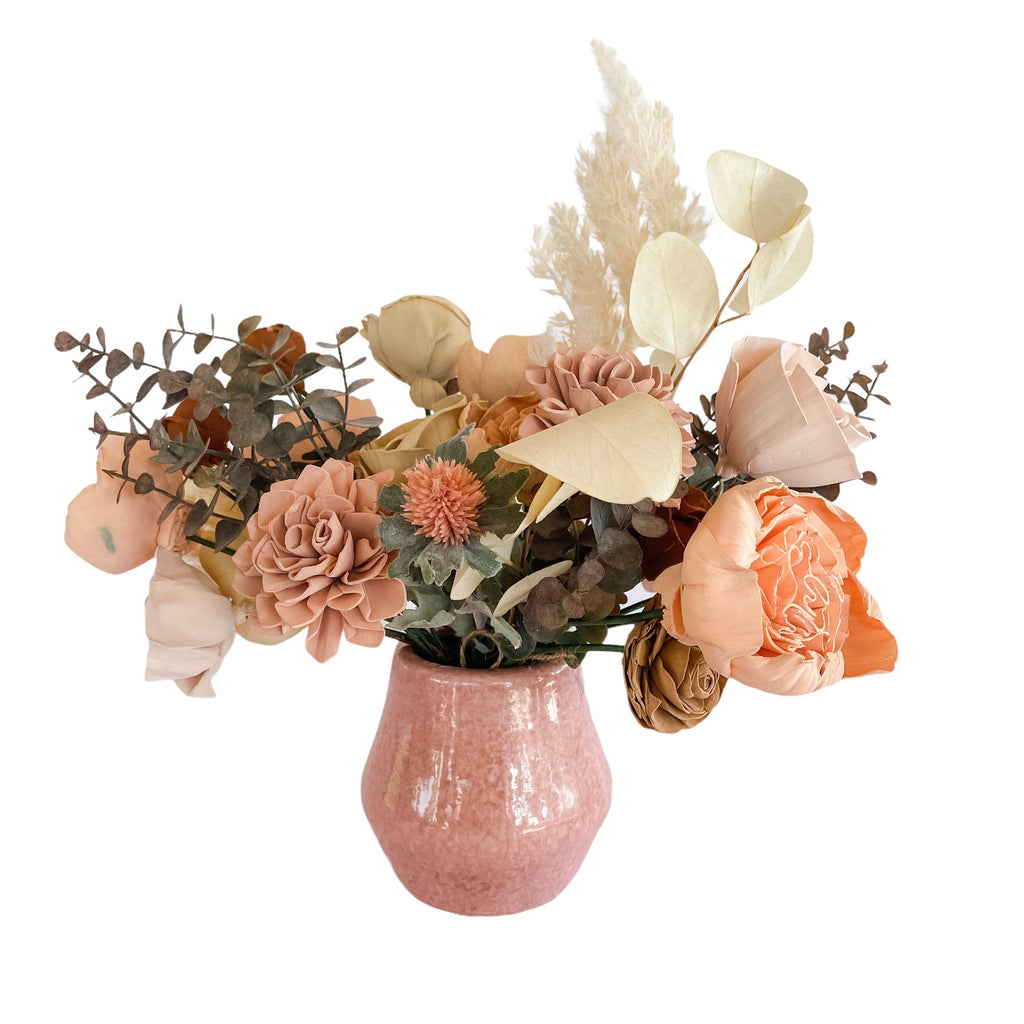 boho peach and pink asymmetrical sola wood flower arrangement by pine and petal market 