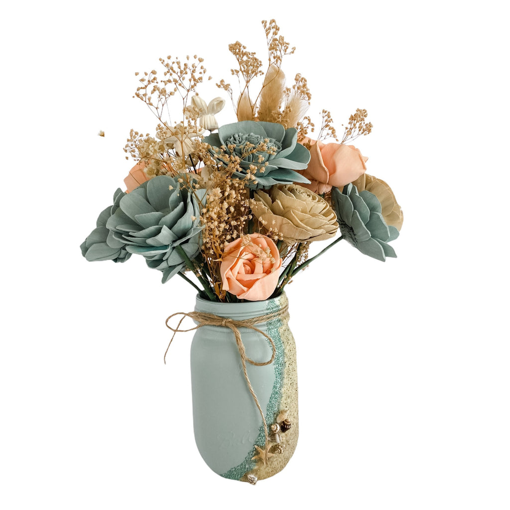 beach babe sola wood flower arrangement in handpainted mason jar with sand and shells