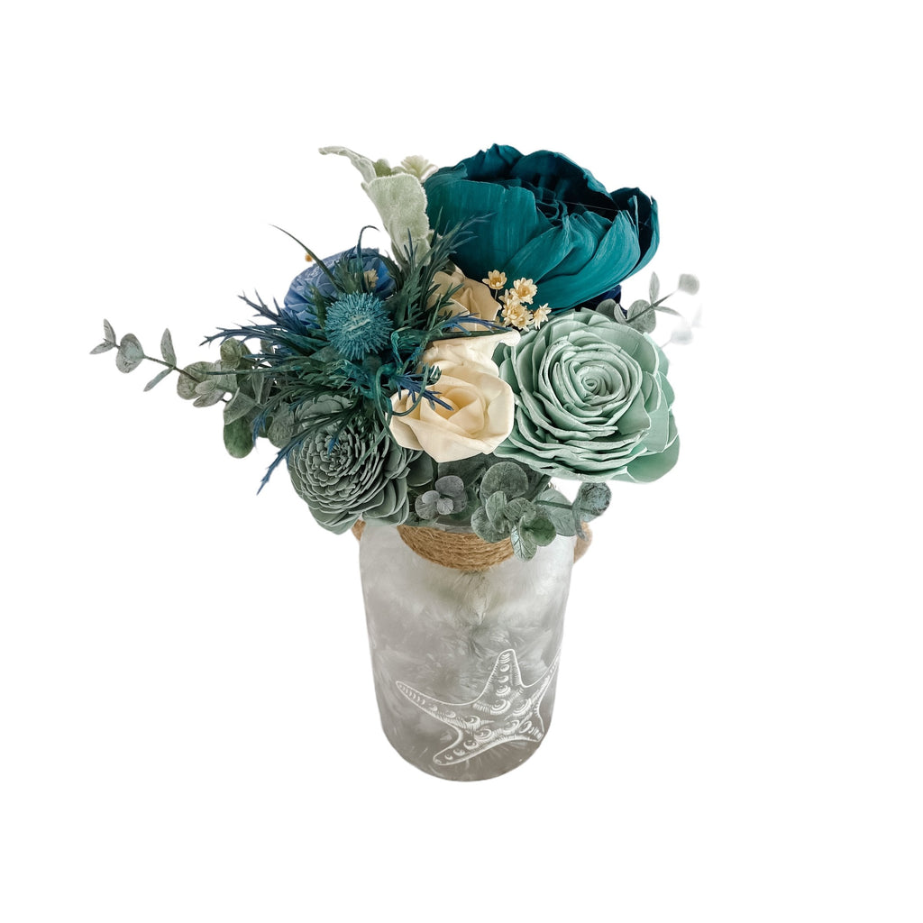 delicate sola flower arrangement for beach home decor from pine and petal market