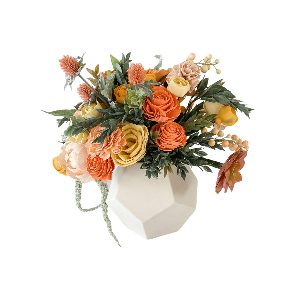 bright color sola wood flower spring time arrangement in geometric vase