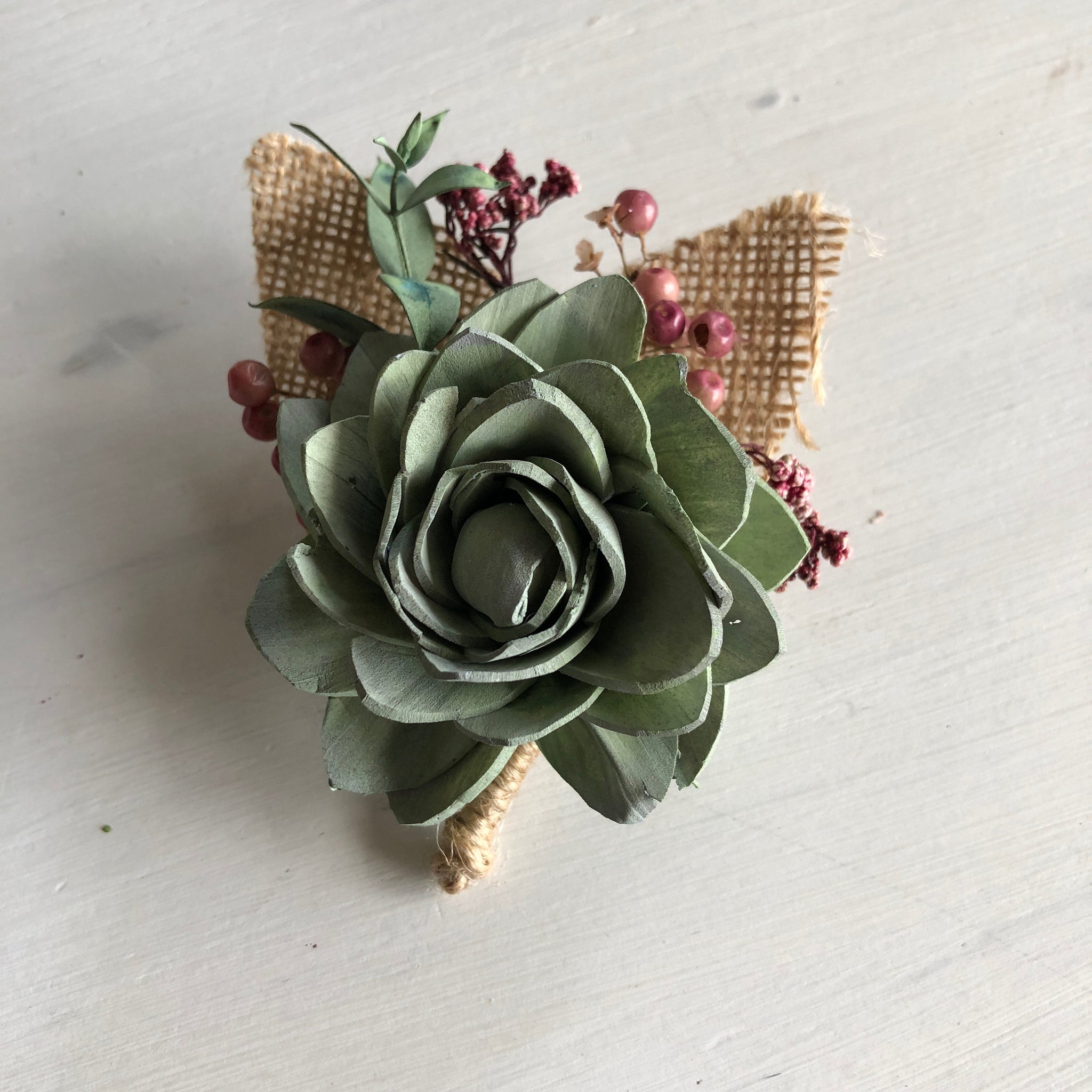 boutonniere with succulents Berry Succulent Sola Flower Boutonnière